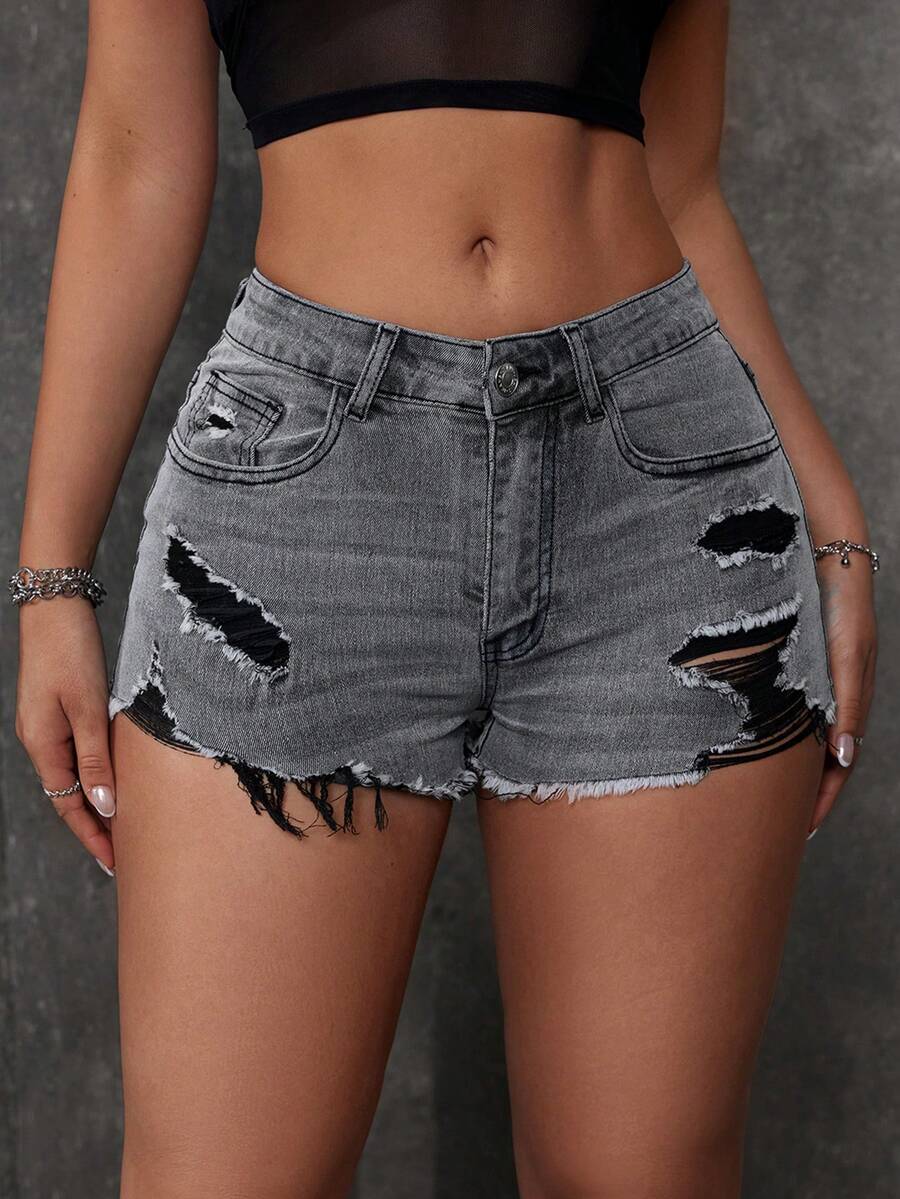 Women's solid color shorts with zipper fly, button closure, pockets, ripped details, and raw hem in a casual straight-leg short length