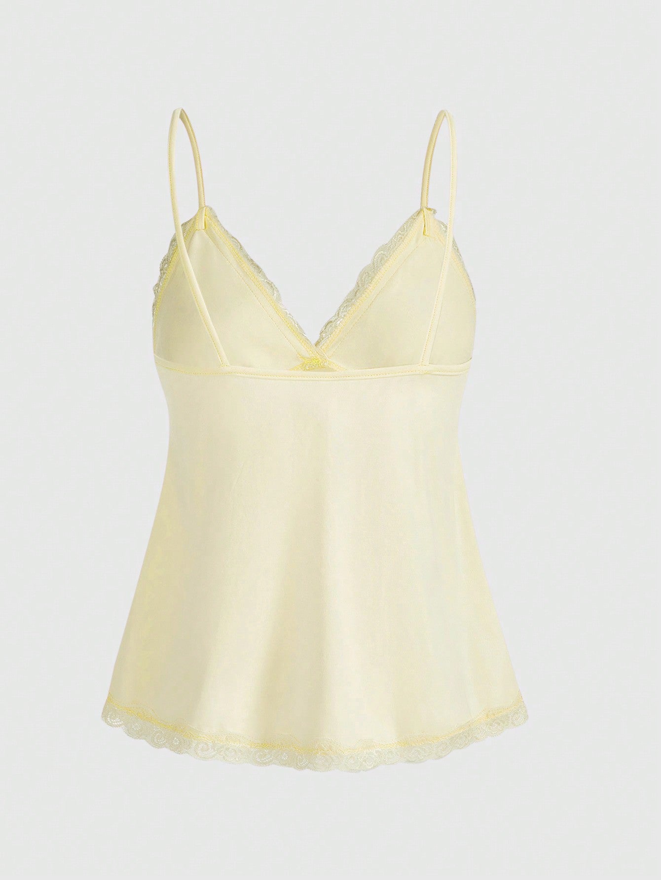 Women's spaghetti strap camisole with contrast lace patchwork, slim fit silhouette, plain design, and flared hem.