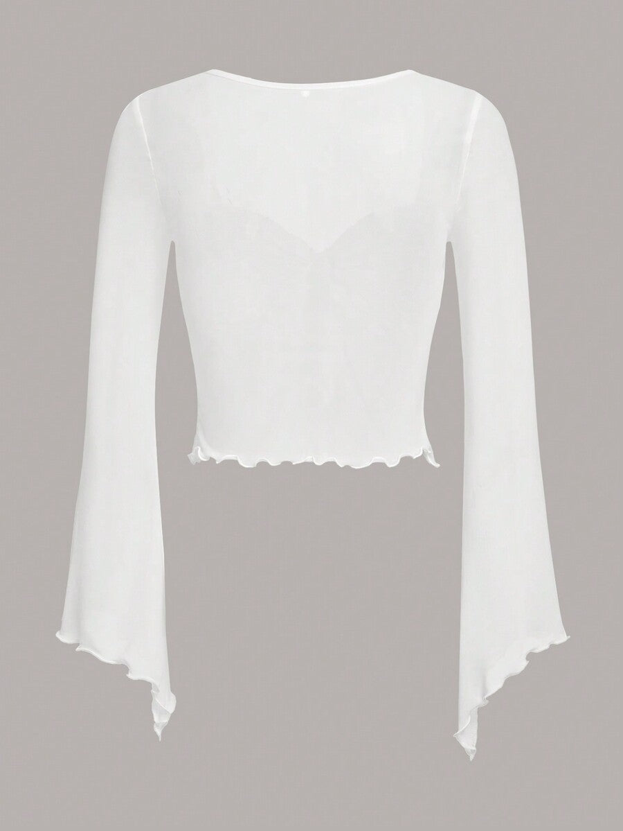 Semi-sheer mesh top featuring a sweetheart neckline with front knot detail, long flare sleeves, lined body, and an asymmetrical hem.