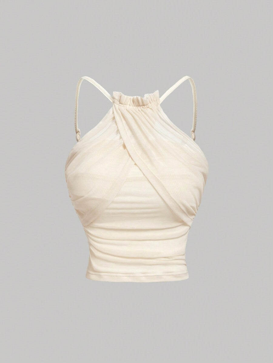 Women's apricot ruched crop tank top featuring spaghetti straps, frill details, and a slim fit design.