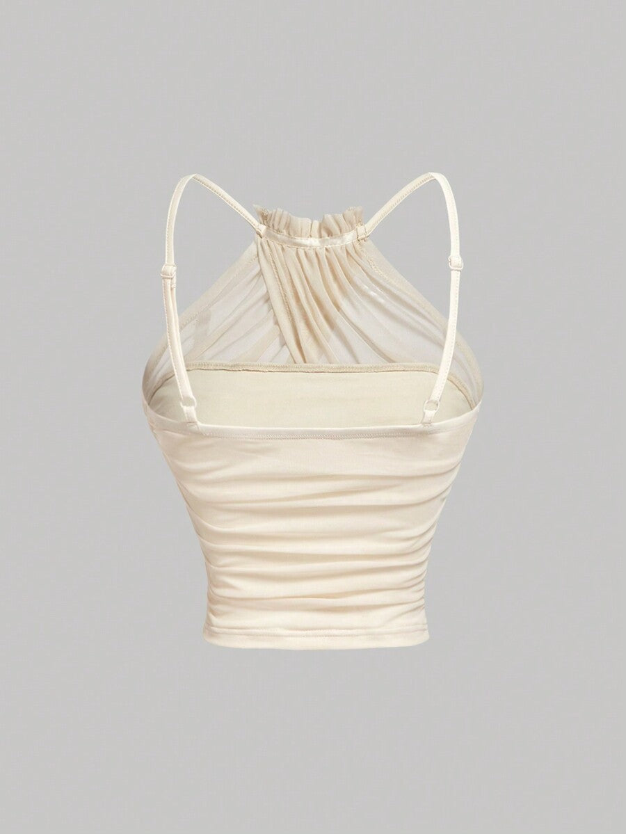 Women's apricot ruched crop tank top featuring spaghetti straps, frill details, and a slim fit design.