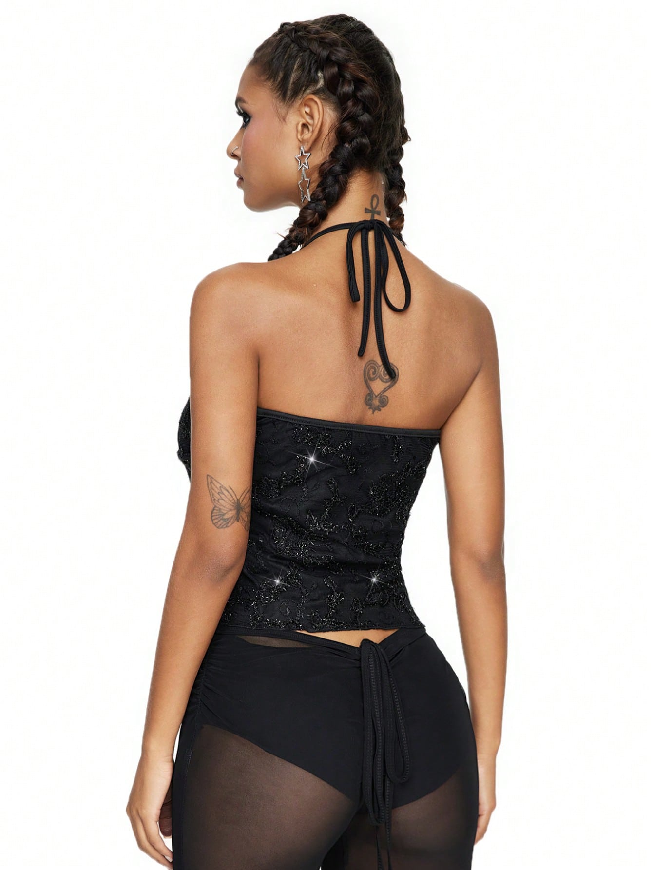 Mesh lace halter top with contrast sequin floral vine embroidery, backless knot detail, and regular fit styling for party, stage, concert, or Halloween looks.
