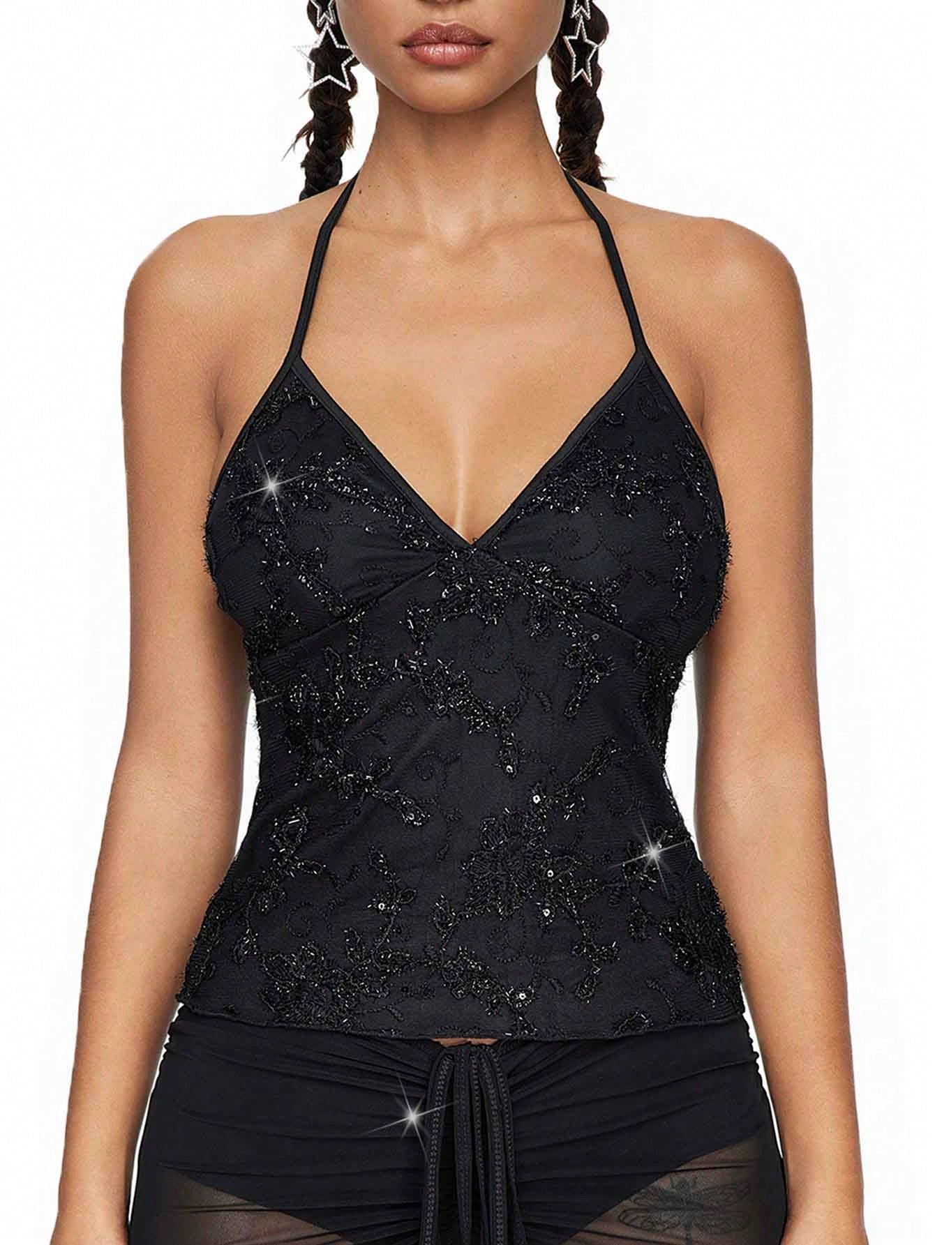 Mesh lace halter top with contrast sequin floral vine embroidery, backless knot detail, and regular fit styling for party, stage, concert, or Halloween looks.