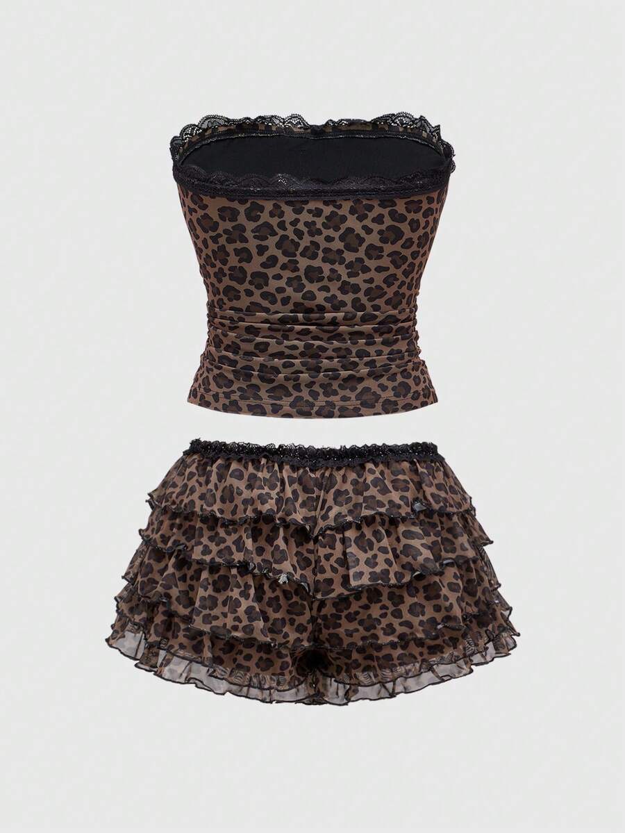 Y2K leopard print two-piece outfit with strapless bandeau top and ruffle mini shorts, featuring contrast lace and a slim fit