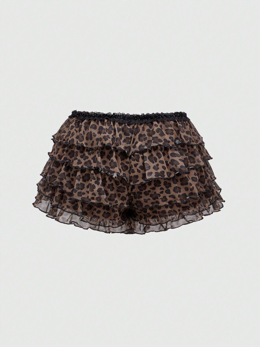 Y2K leopard print two-piece outfit with strapless bandeau top and ruffle mini shorts, featuring contrast lace and a slim fit