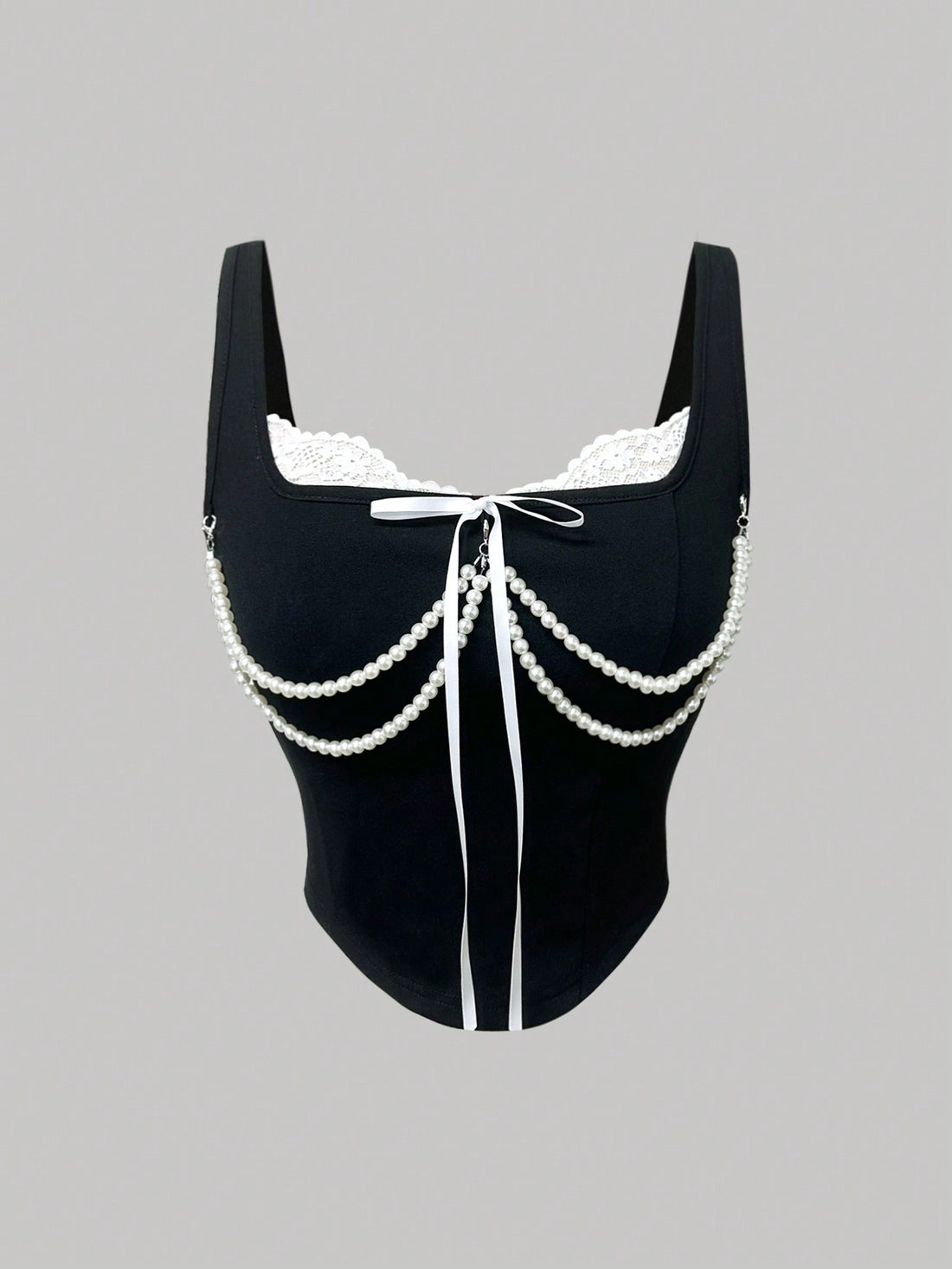 women's black wide-strap tank top featuring a lace collar, detachable bow chain decor with pearl details, and an asymmetrical hem.