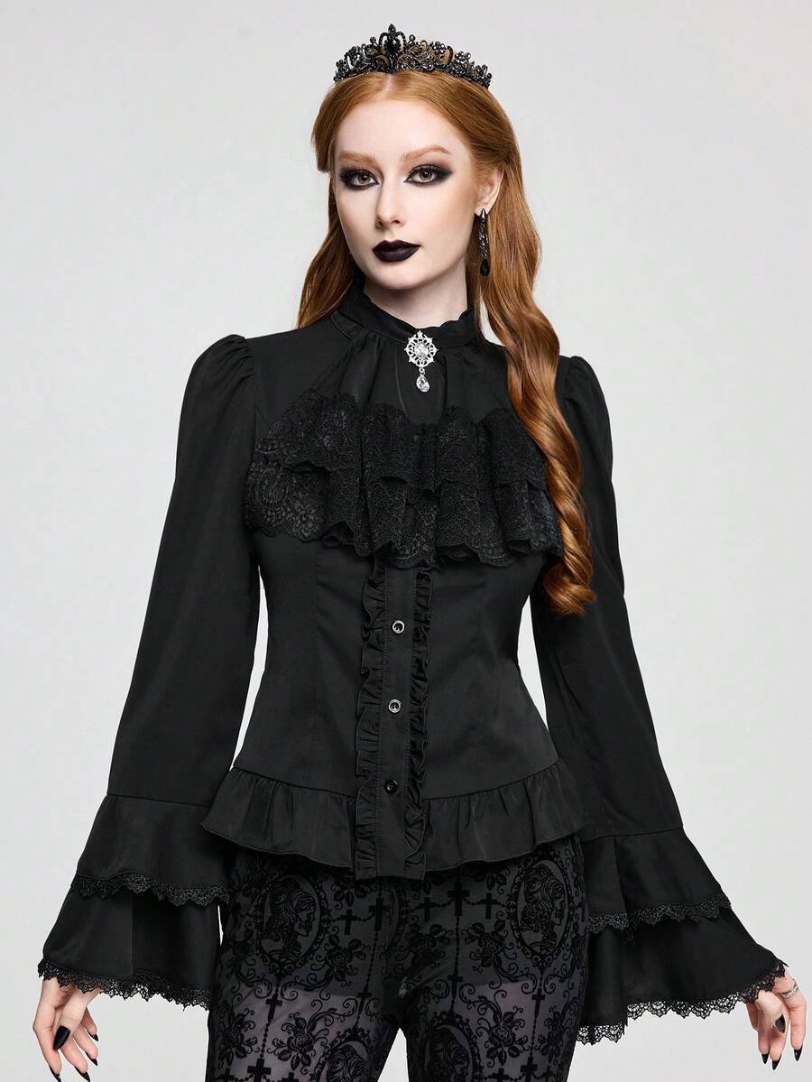 Vintage gothic style women's blouse with stand collar, detachable ruffled bow tie, gem pendant, and flare sleeves