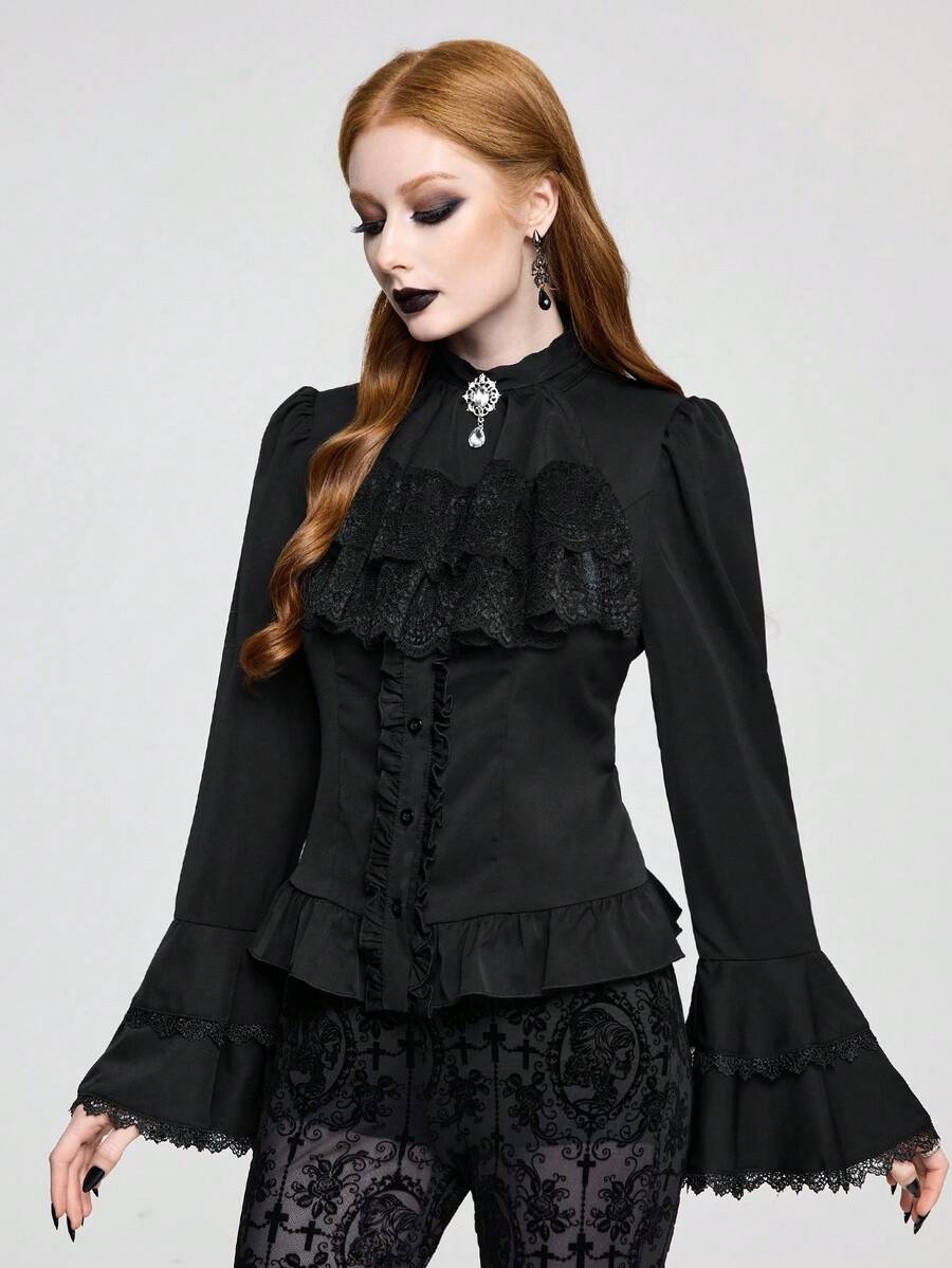 Vintage gothic style women's blouse with stand collar, detachable ruffled bow tie, gem pendant, and flare sleeves