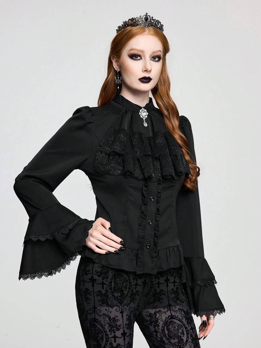Vintage gothic style women's blouse with stand collar, detachable ruffled bow tie, gem pendant, and flare sleeves