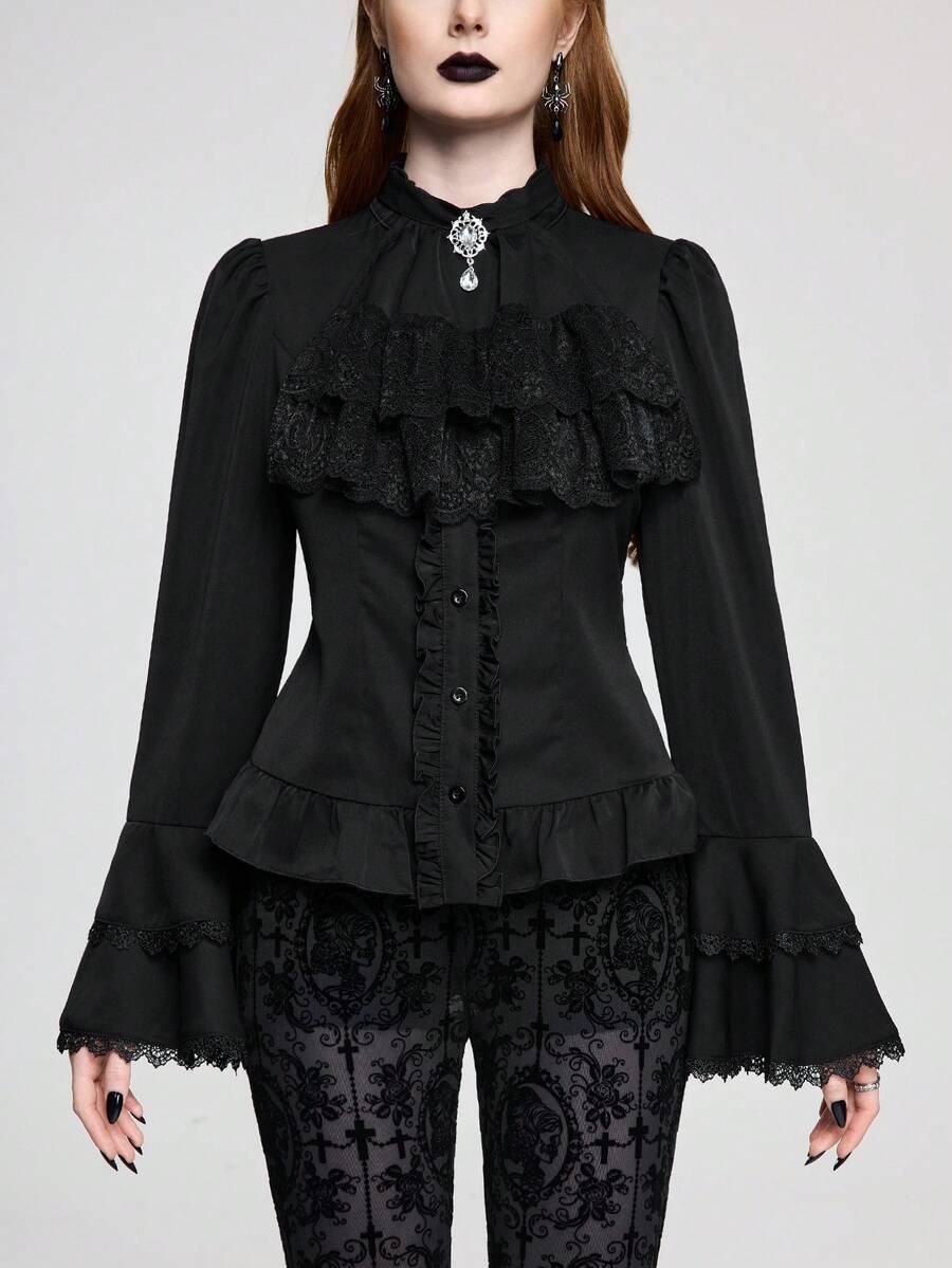 Vintage gothic style women's blouse with stand collar, detachable ruffled bow tie, gem pendant, and flare sleeves