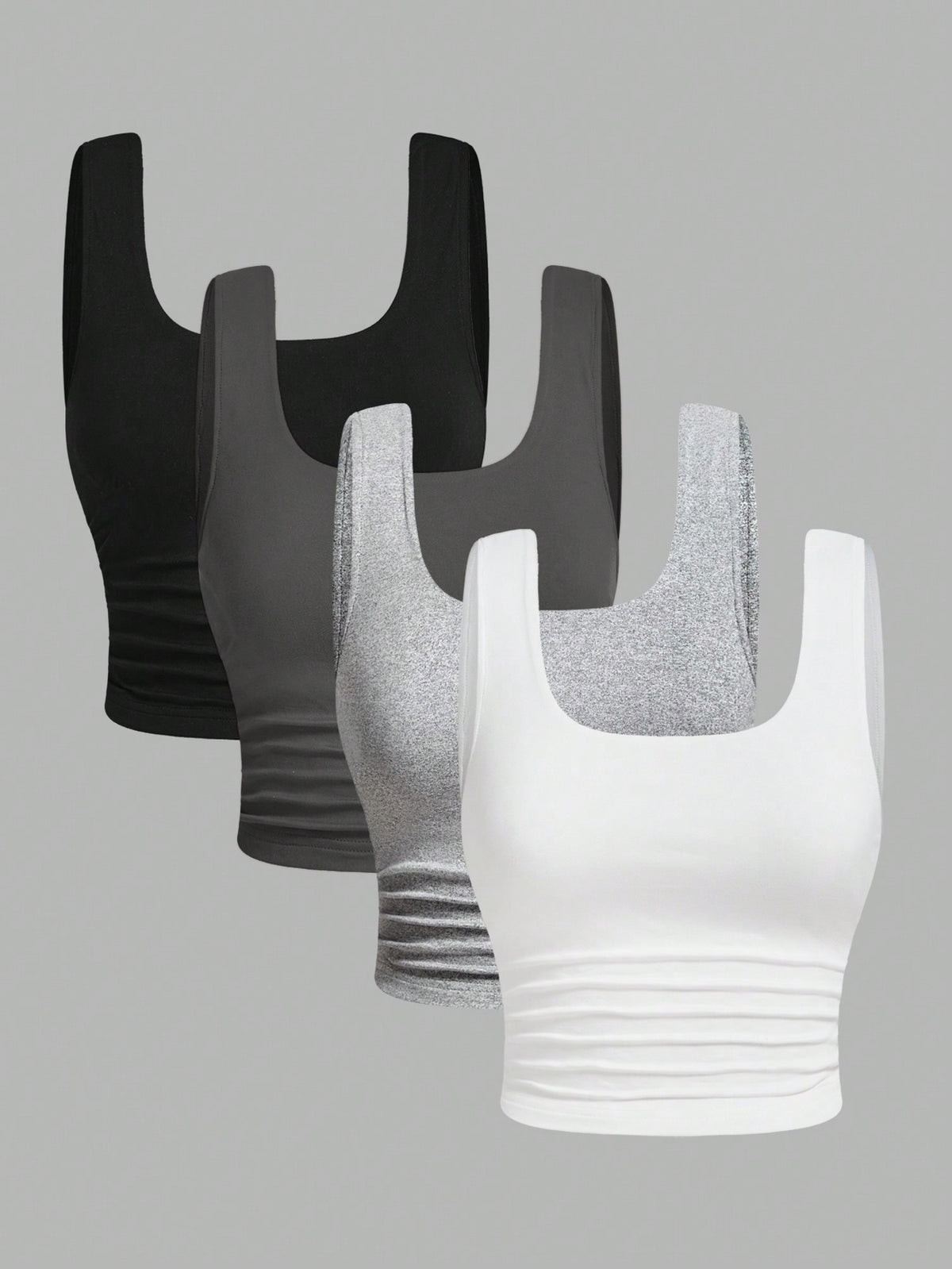 Women's knitted slim fit crop camisole tank top featuring a scoop neck and ruched detailing.