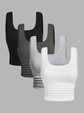 Women's knitted slim fit crop camisole tank top featuring a scoop neck and ruched detailing.