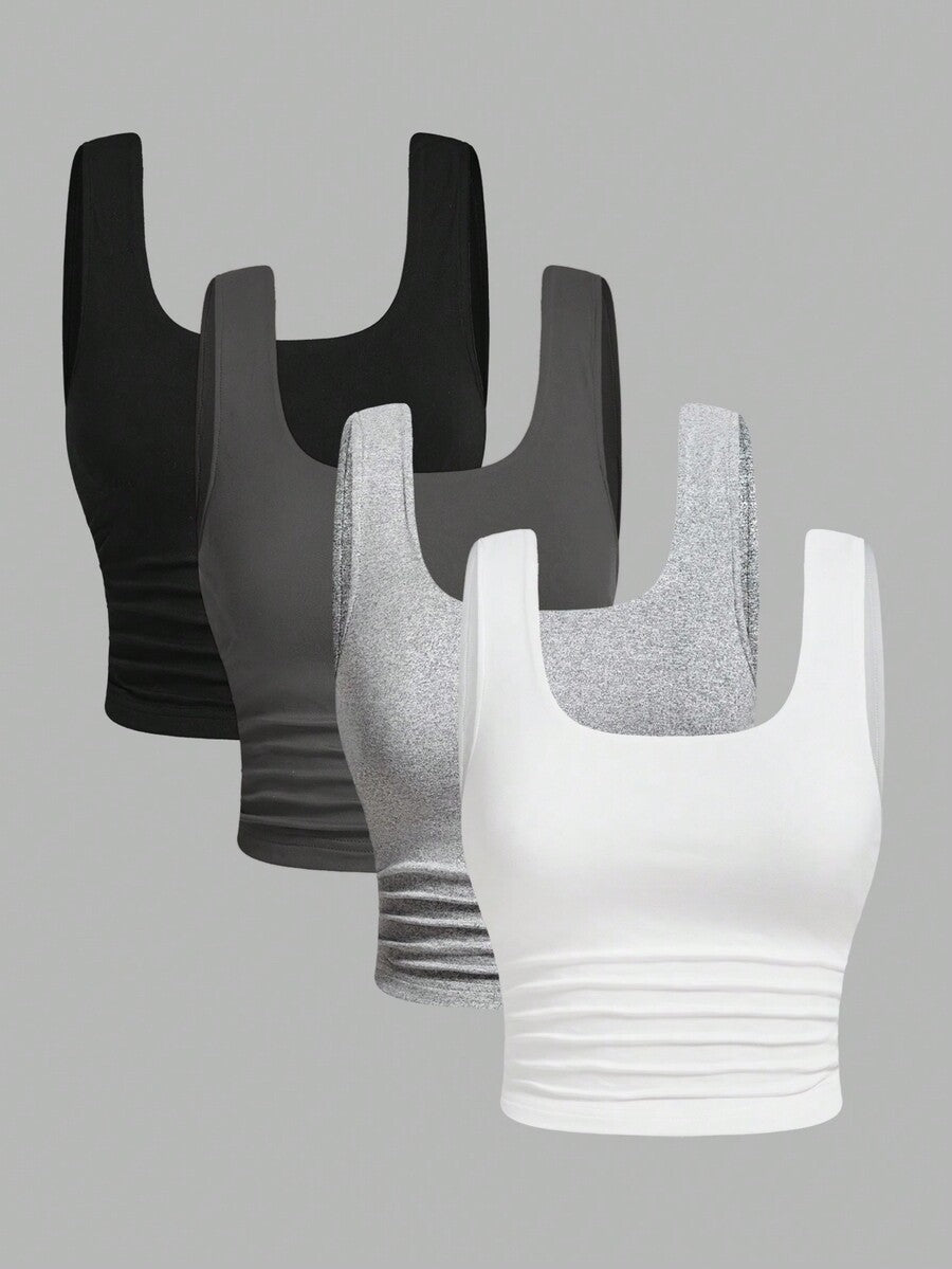 Women's knitted slim fit crop camisole tank top featuring a scoop neck and ruched detailing.
