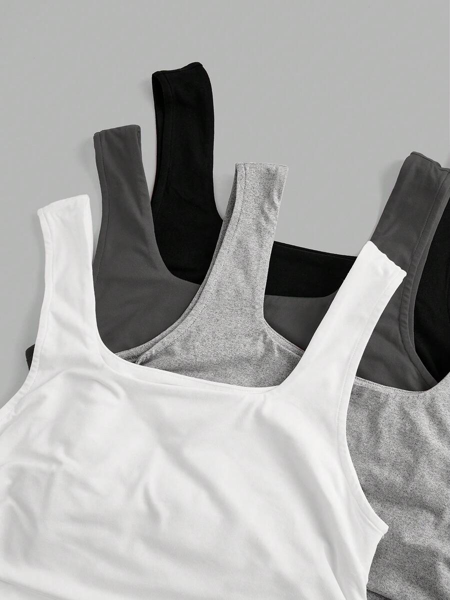 Women's knitted slim fit crop camisole tank top featuring a scoop neck and ruched detailing.