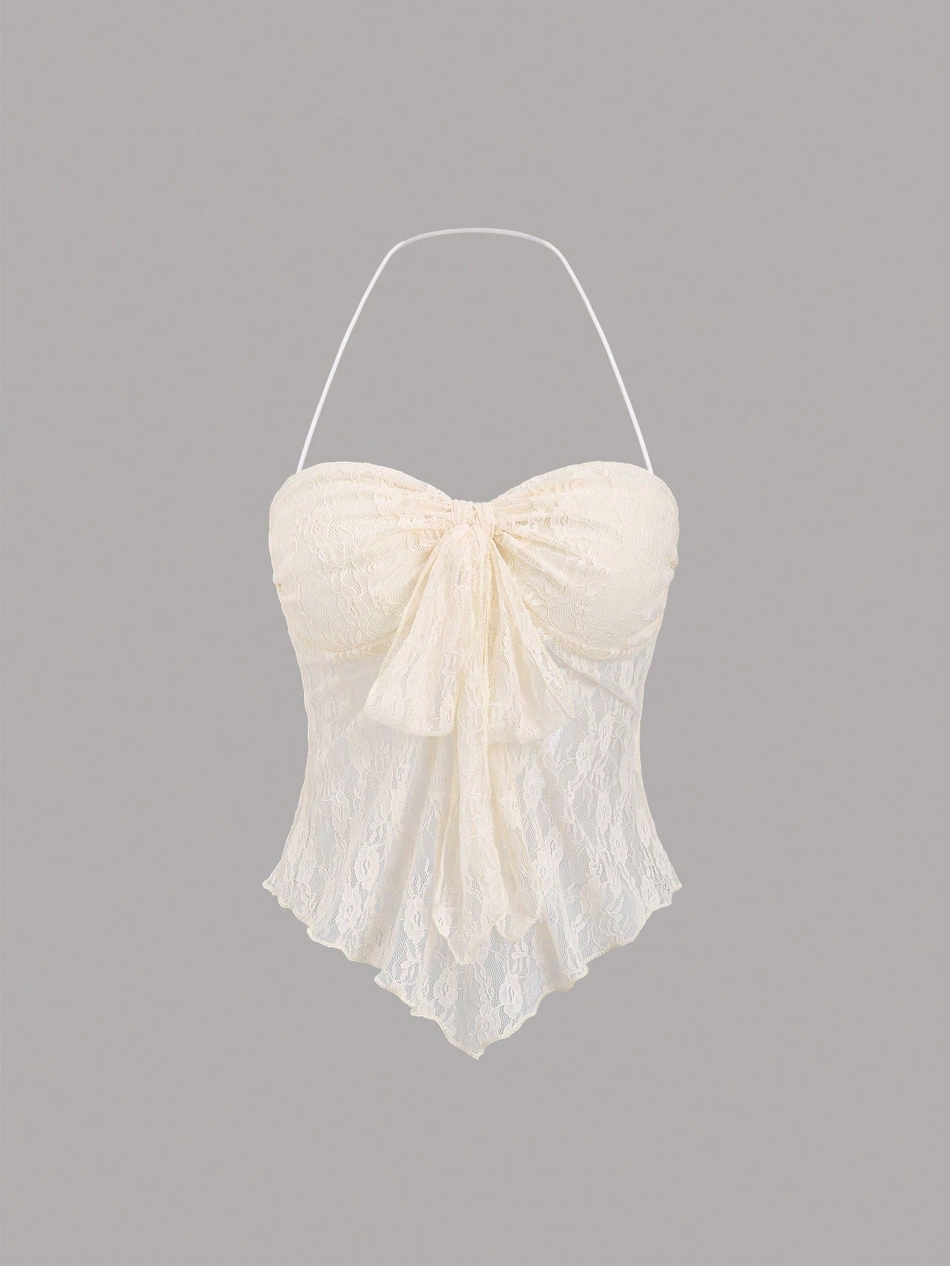 Women's black lace halter crop top with contrast bow front, backless styling, semi-sheer finish, and asymmetrical hem