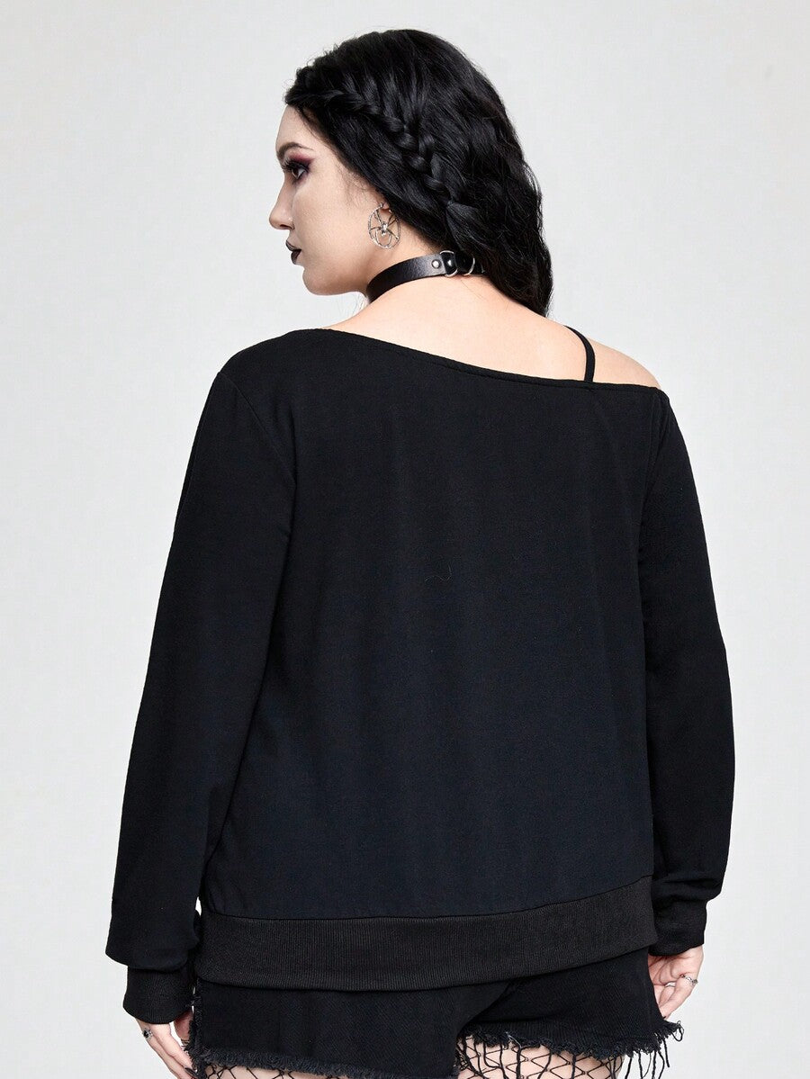 Black women's loose long sleeve gothic sweatshirt with an asymmetrical neckline, strap detail, and fang graphic print.