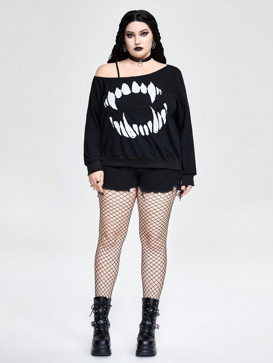 Black women's loose long sleeve gothic sweatshirt with an asymmetrical neckline, strap detail, and fang graphic print.