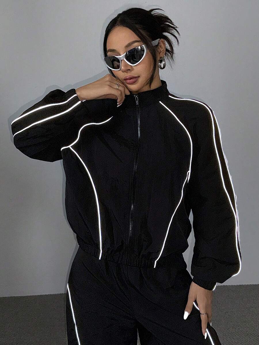 Women's black casual reflective windbreaker sports set featuring a loose stand collar zip jacket and matching unlined pants.