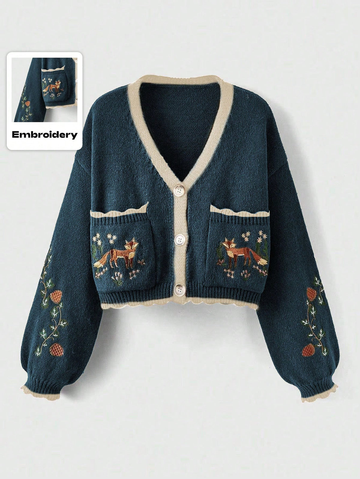 Multicolor women's cropped knit cardigan featuring floral embroidery, V-neckline, bishop long sleeves, button front, and contrast patchwork border.
