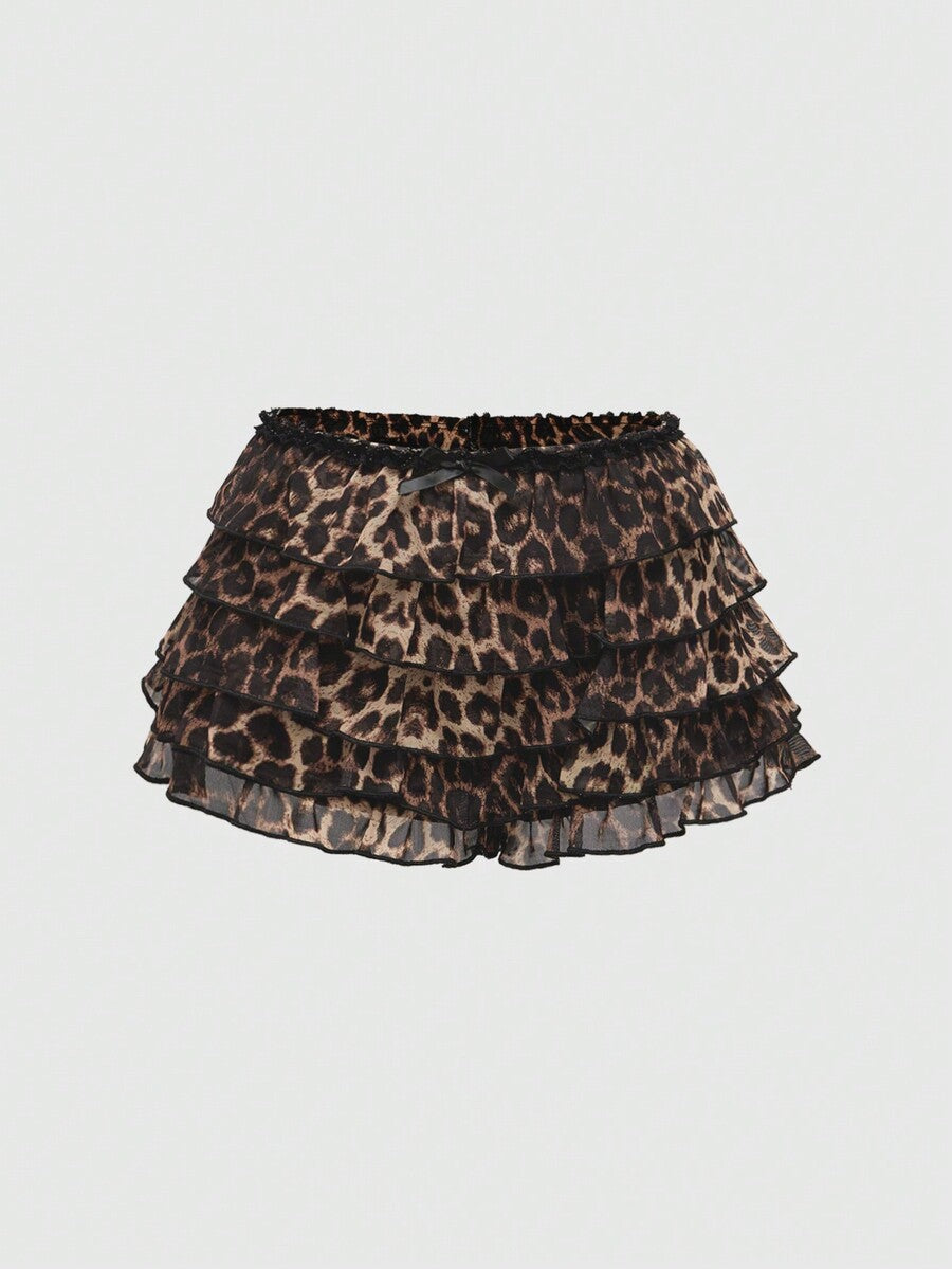 Y2K leopard print two-piece outfit with strapless bandeau top and ruffle mini shorts, featuring contrast lace and a slim fit