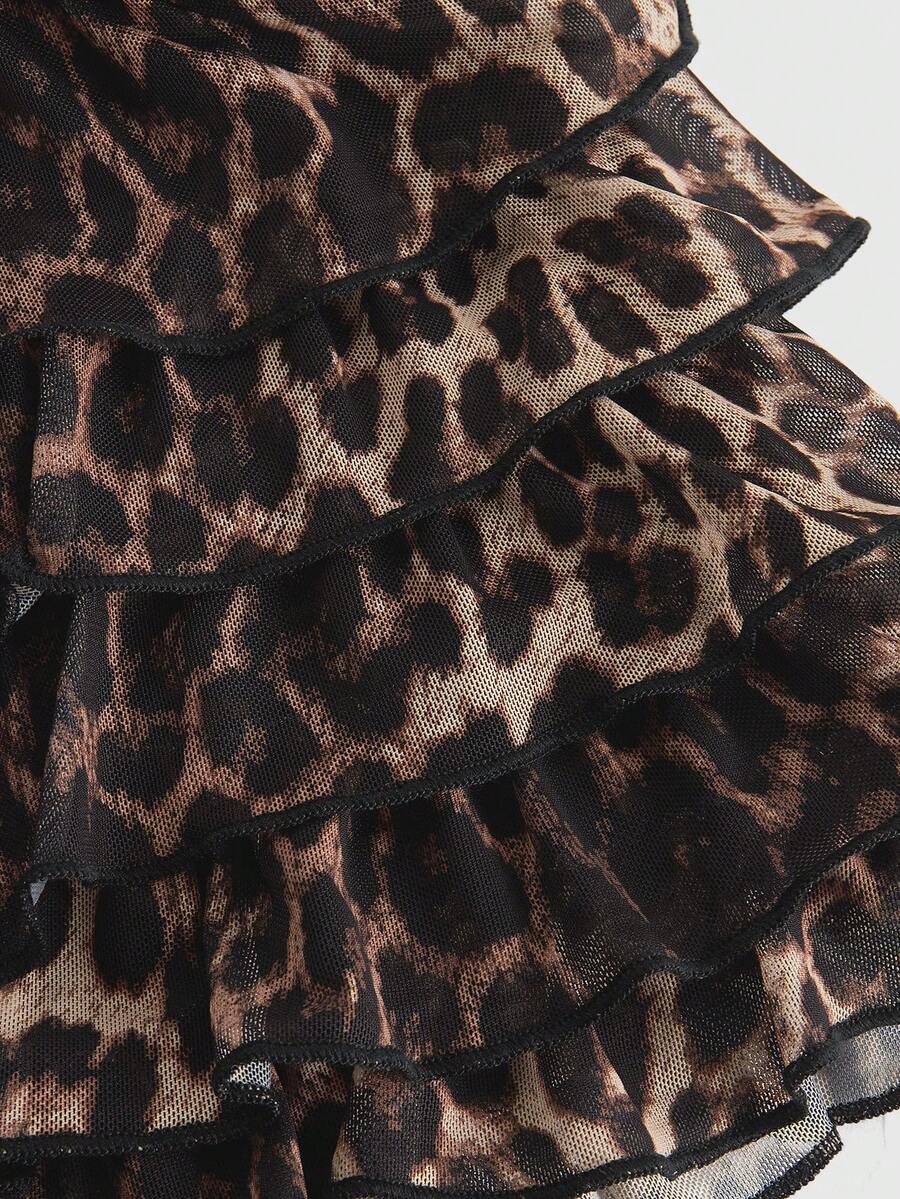Y2K leopard print two-piece outfit with strapless bandeau top and ruffle mini shorts, featuring contrast lace and a slim fit