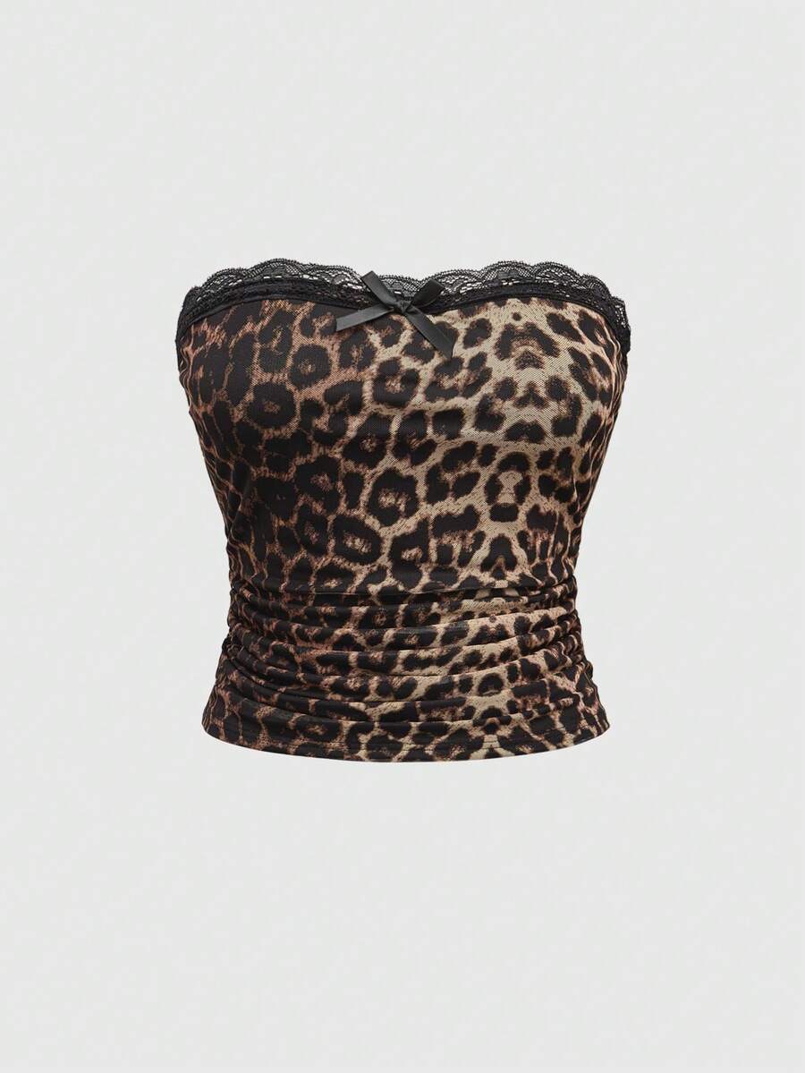 Y2K leopard print two-piece outfit with strapless bandeau top and ruffle mini shorts, featuring contrast lace and a slim fit