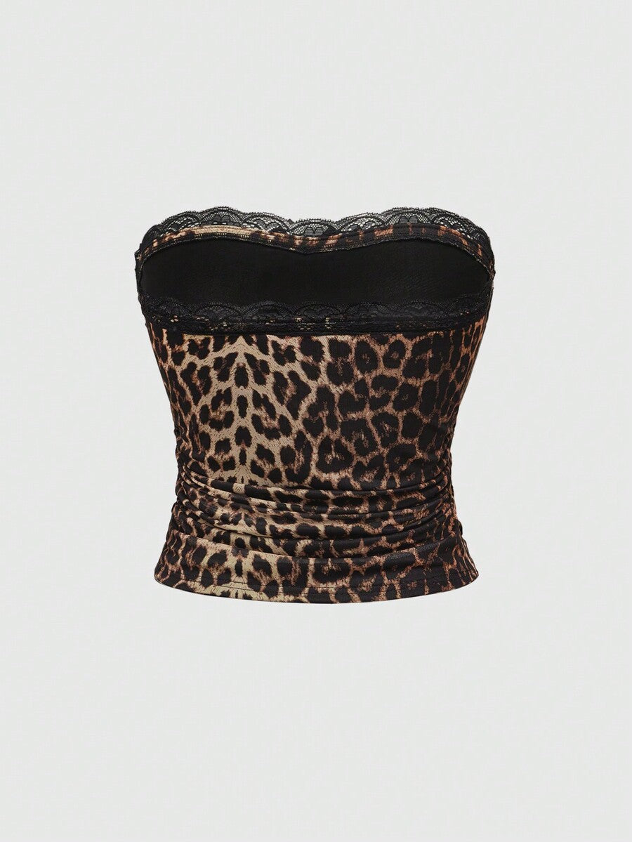 Y2K leopard print two-piece outfit with strapless bandeau top and ruffle mini shorts, featuring contrast lace and a slim fit