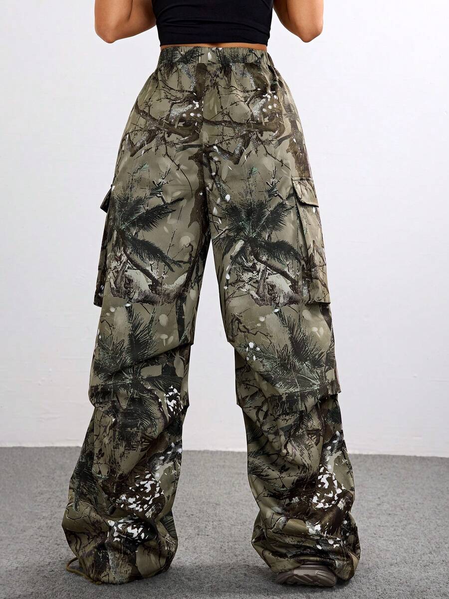 Women's high waist wide leg cargo pants featuring a black and white tree branch print and adjustable drawstring closure.