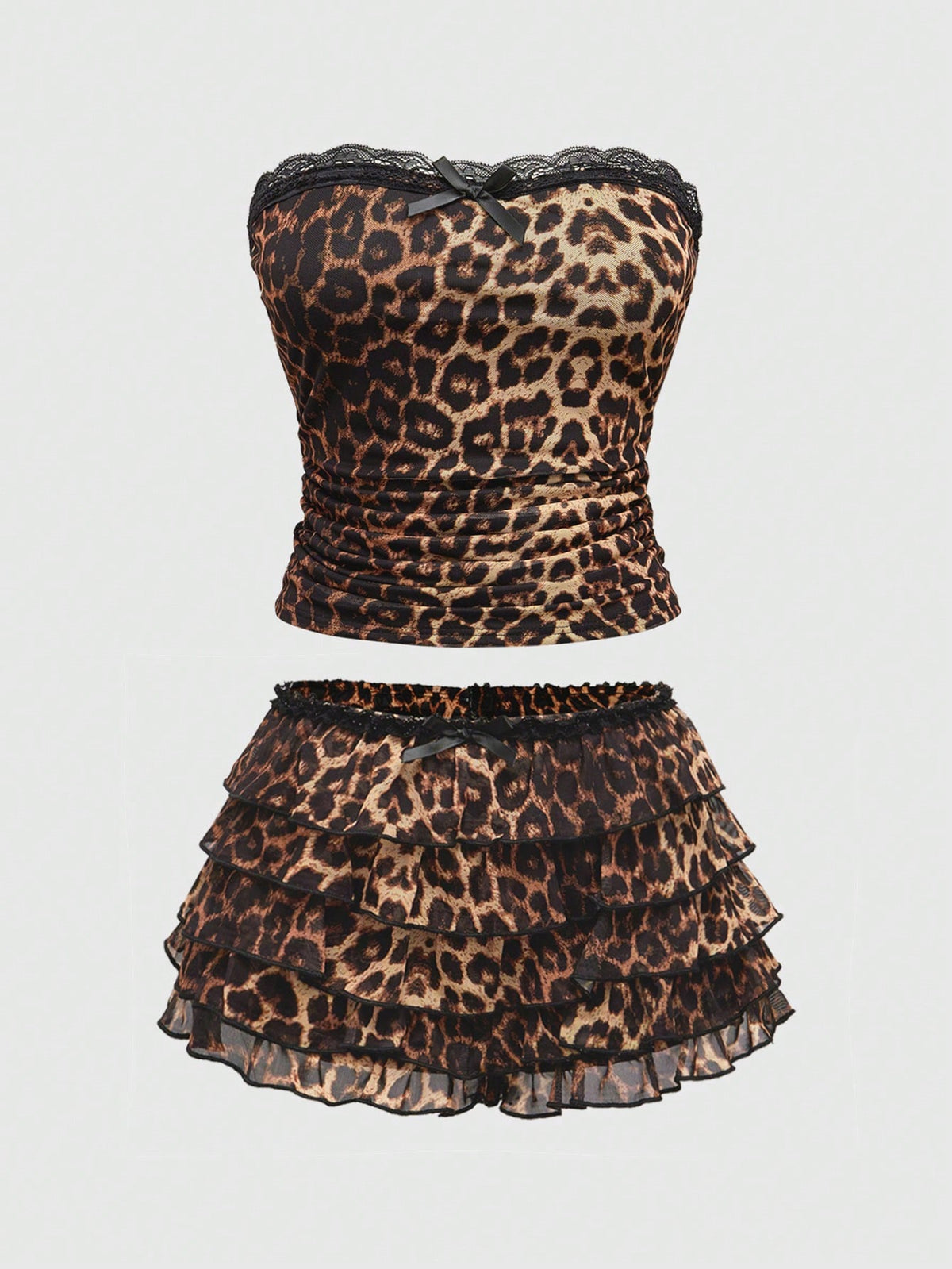 Y2K leopard print two-piece outfit with strapless bandeau top and ruffle mini shorts, featuring contrast lace and a slim fit