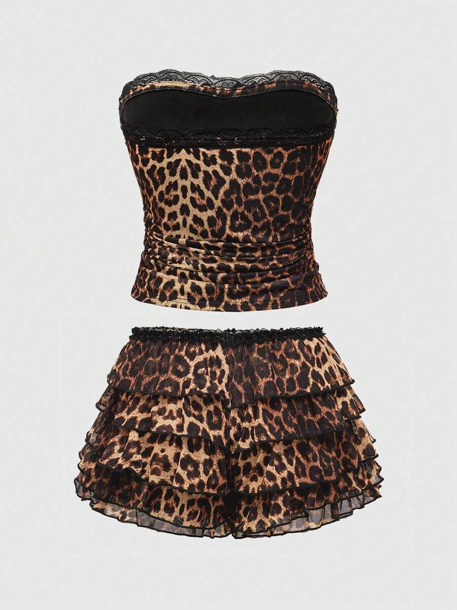 Y2K leopard print two-piece outfit with strapless bandeau top and ruffle mini shorts, featuring contrast lace and a slim fit