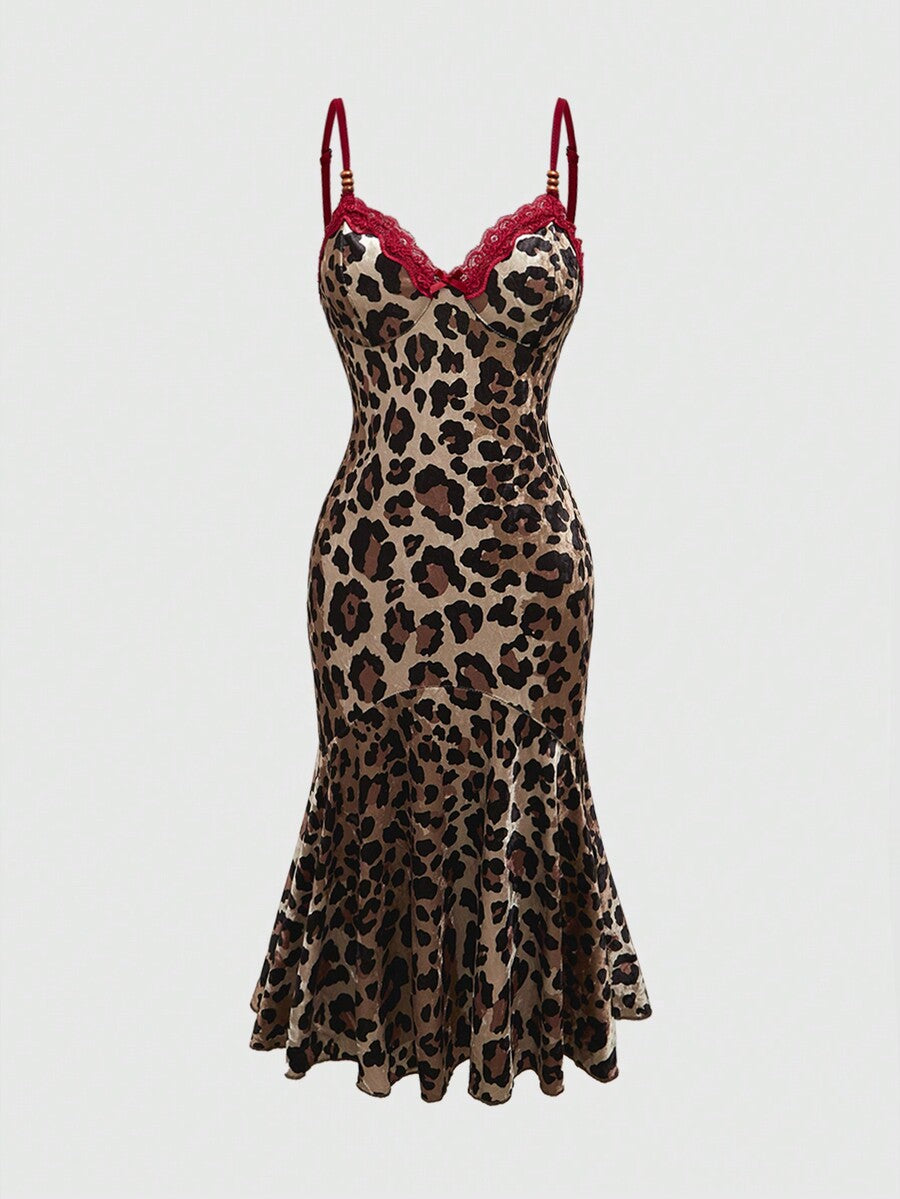 Women's sleeveless leopard print halter cocktail dress featuring contrast lace details, a backless cut, high waist, and a mermaid ruffle hem.