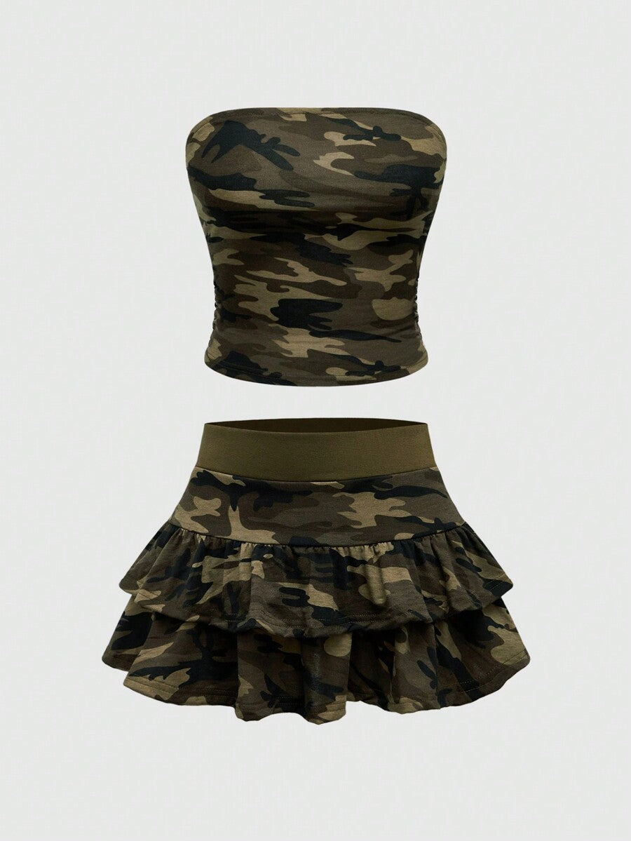 Multicolor camo print two-piece outfit with strapless bandeau crop top and matching ruched tiered mini skirt with ruffle hem.