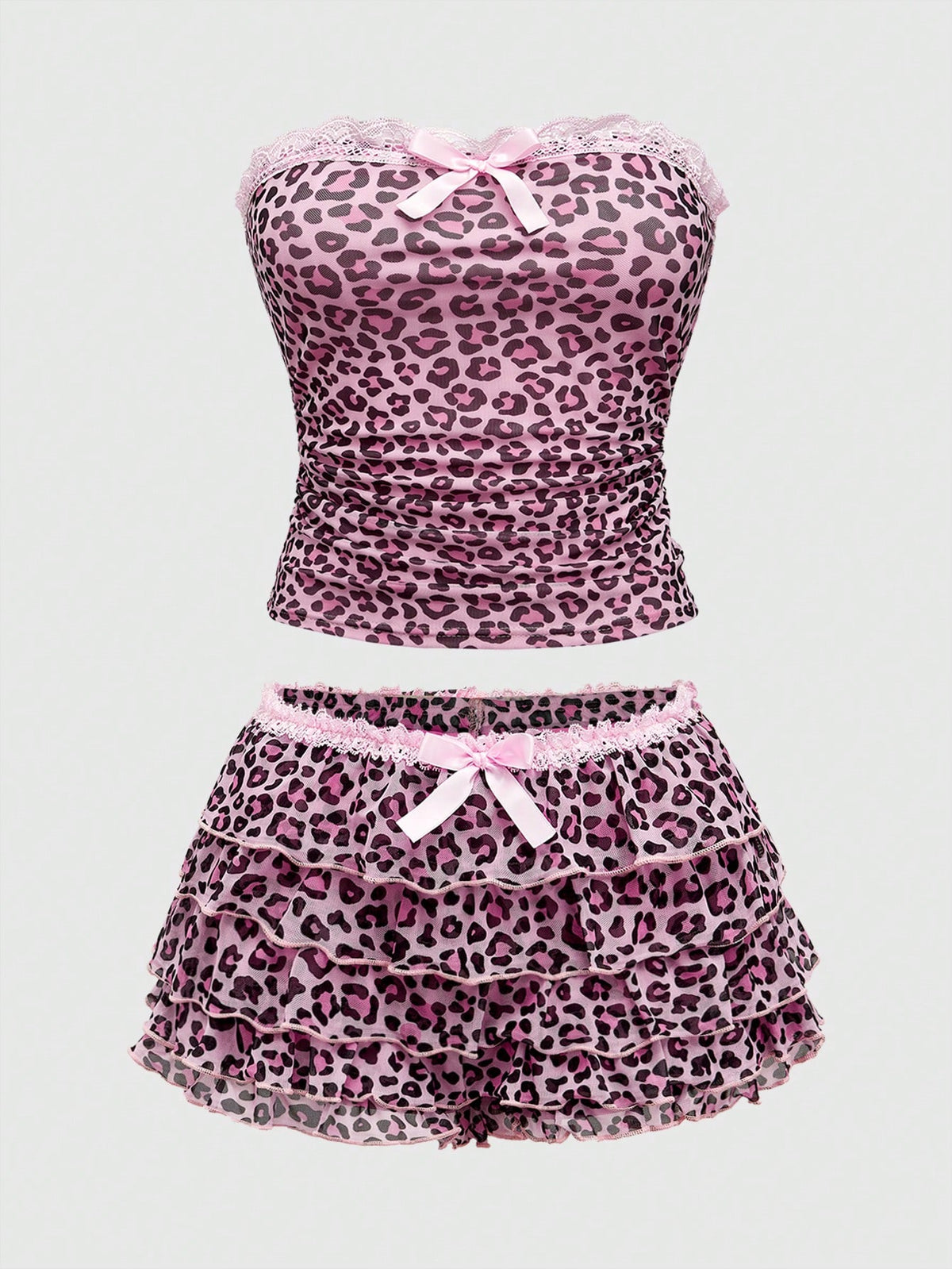 Y2K leopard print two-piece outfit with strapless bandeau top and ruffle mini shorts, featuring contrast lace and a slim fit