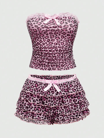 Y2K leopard print two-piece outfit with strapless bandeau top and ruffle mini shorts, featuring contrast lace and a slim fit