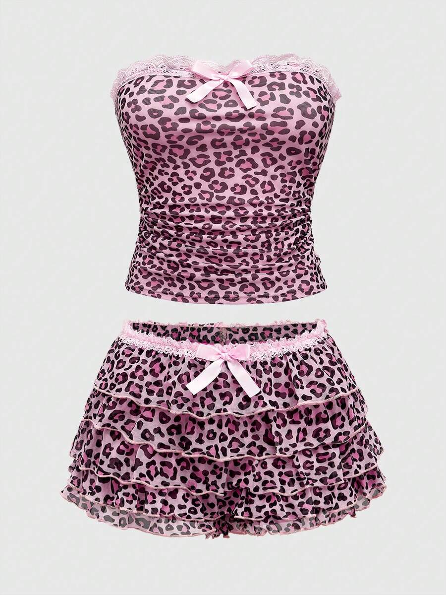 Y2K leopard print two-piece outfit with strapless bandeau top and ruffle mini shorts, featuring contrast lace and a slim fit