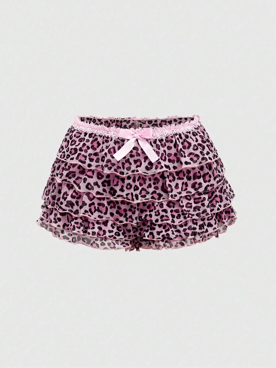Y2K leopard print two-piece outfit with strapless bandeau top and ruffle mini shorts, featuring contrast lace and a slim fit