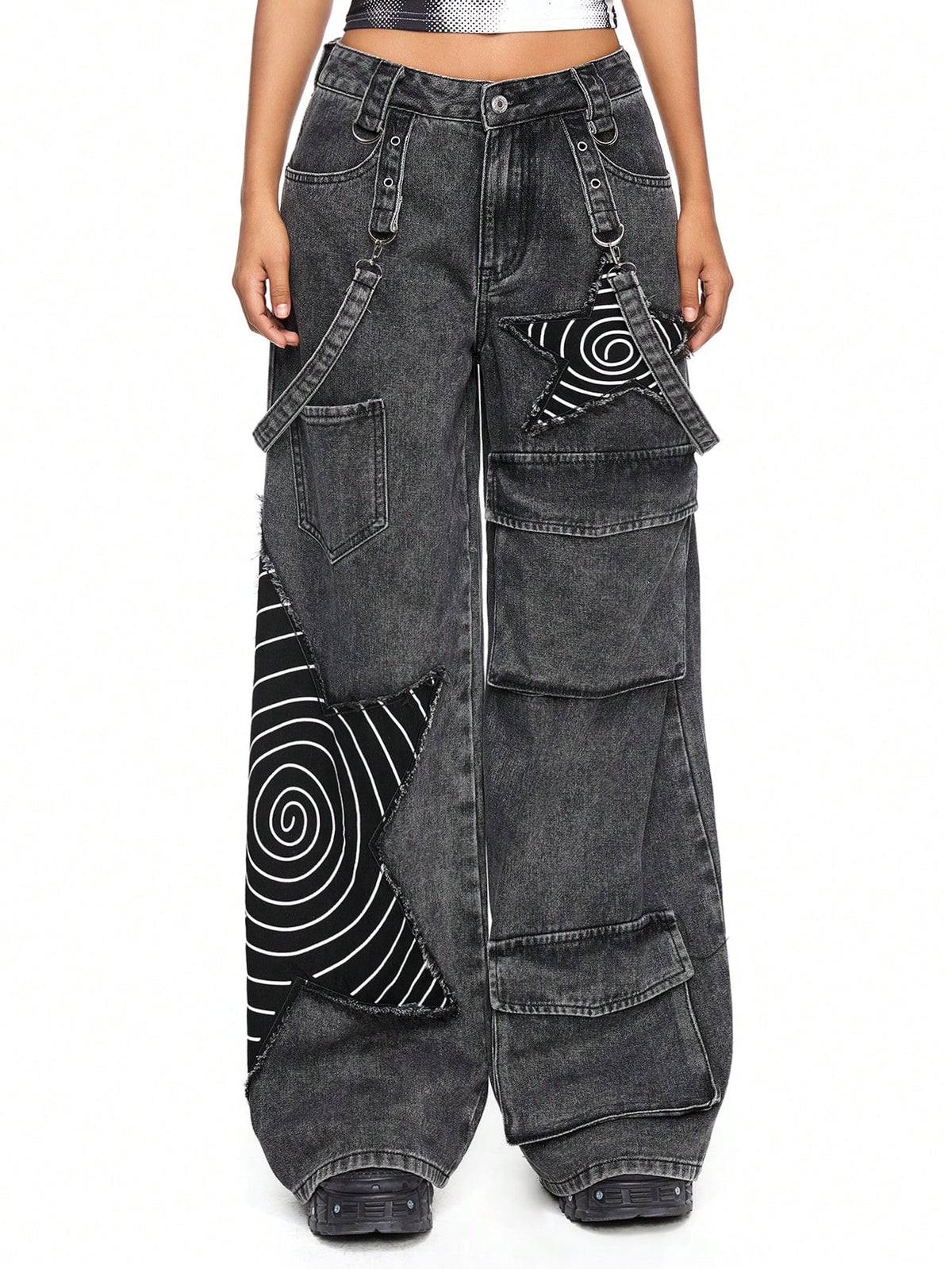Women's loose fit wide leg cargo jeans in distressed washed denim featuring star patch details and side pockets.