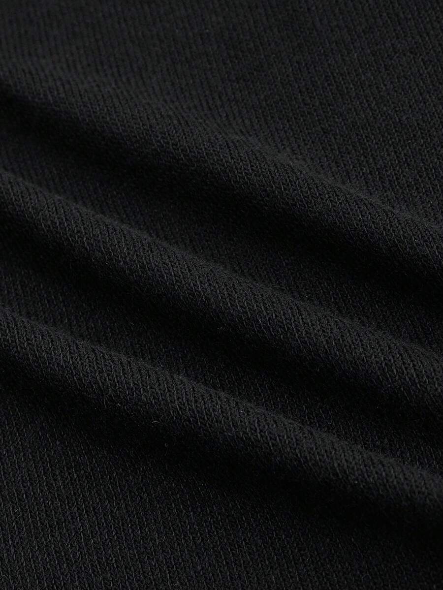 Black long sleeve open front micro crop top featuring contrast fluffy faux fur trim and knitted fabric.