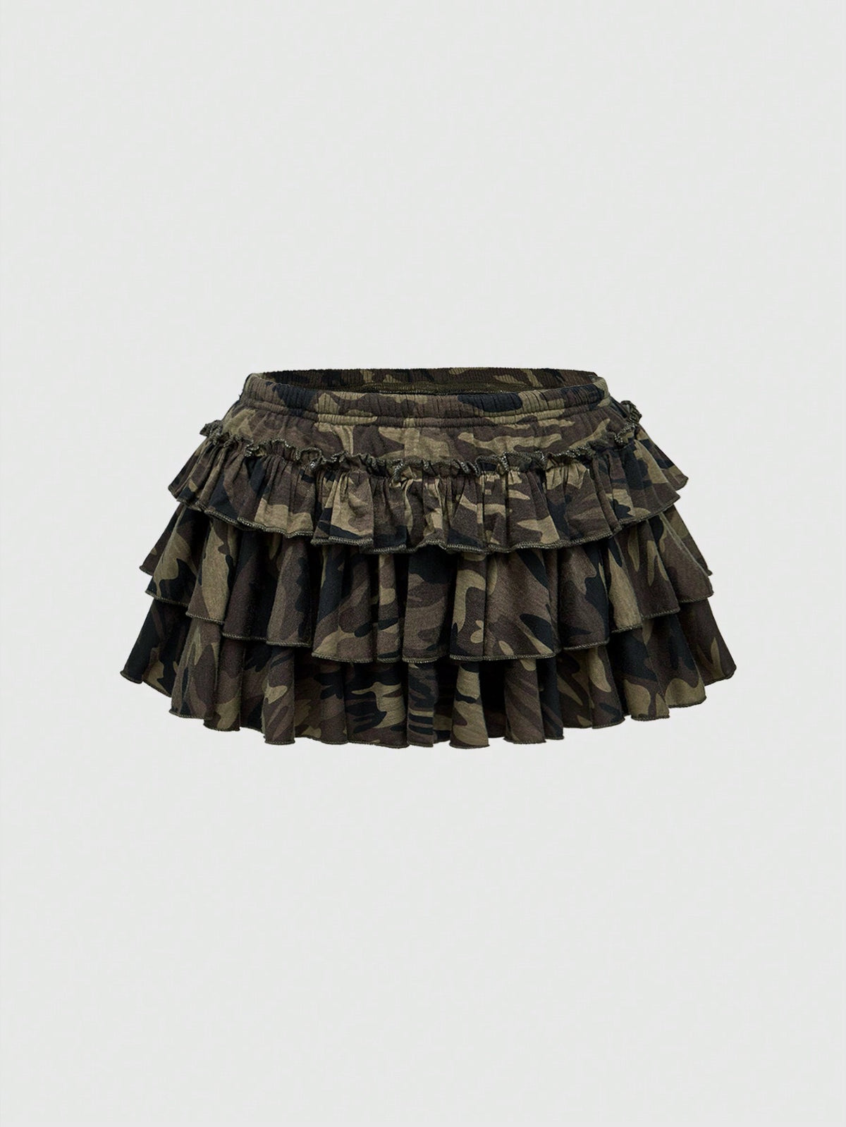 Women's low waist tiered mini skirt featuring ruffled hem layers in knitted stretch fabric.