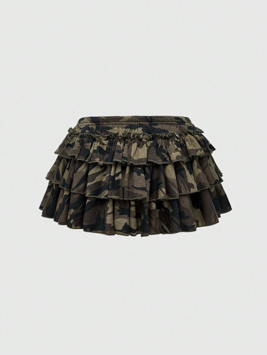 Women's low waist tiered mini skirt featuring ruffled hem layers in knitted stretch fabric.