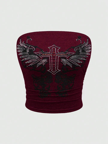 Women's strapless star-printed crop tube top with rhinestone and ruched details.