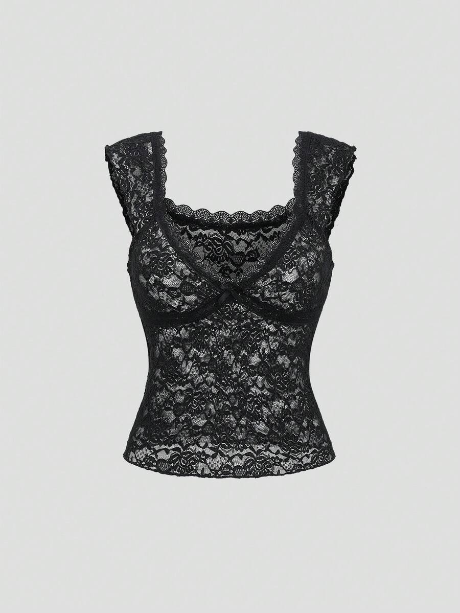 Black crop camisole top featuring wide shoulder straps, sweetheart neckline, and semi-sheer contrast lace detailing.