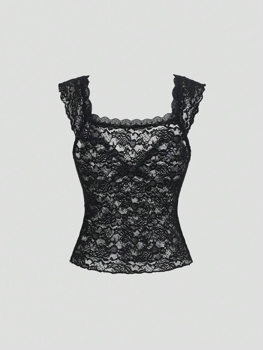 Black crop camisole top featuring wide shoulder straps, sweetheart neckline, and semi-sheer contrast lace detailing.