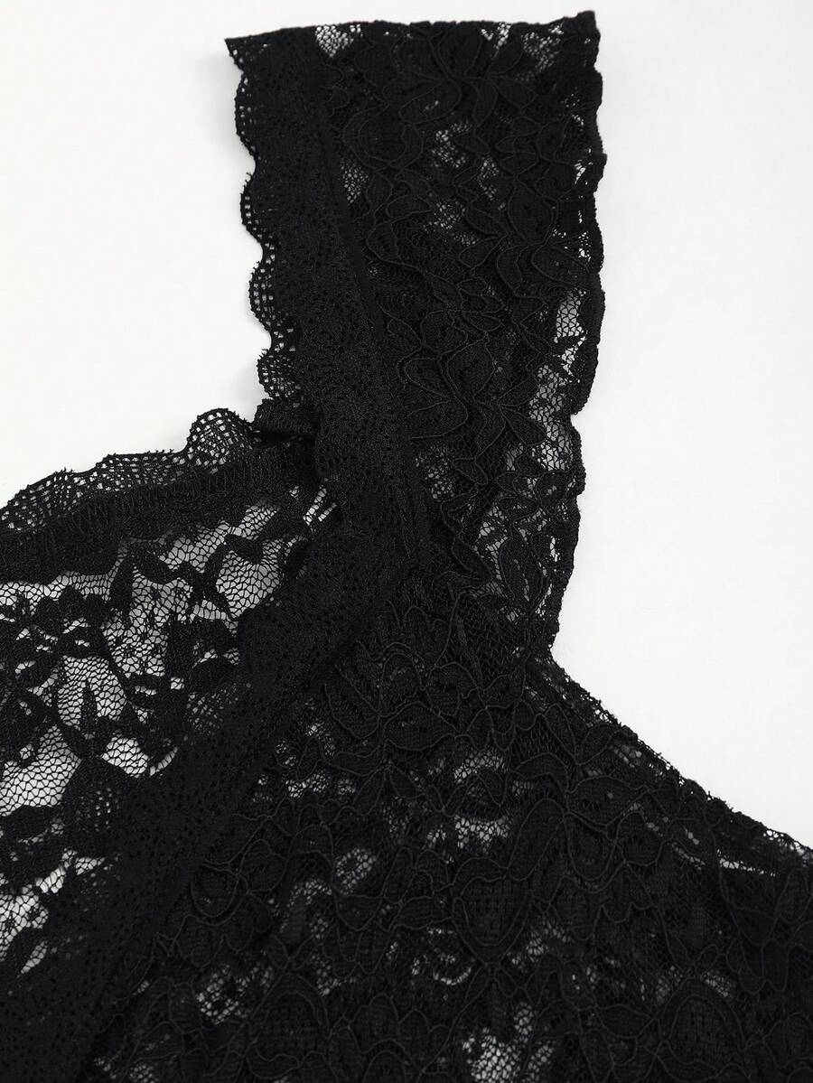 Black crop camisole top featuring wide shoulder straps, sweetheart neckline, and semi-sheer contrast lace detailing.