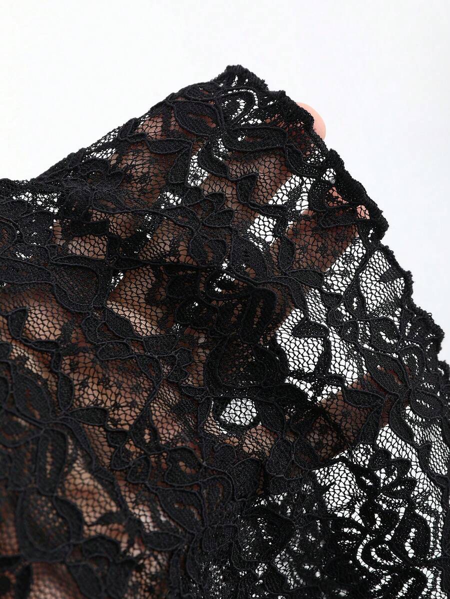 Black crop camisole top featuring wide shoulder straps, sweetheart neckline, and semi-sheer contrast lace detailing.