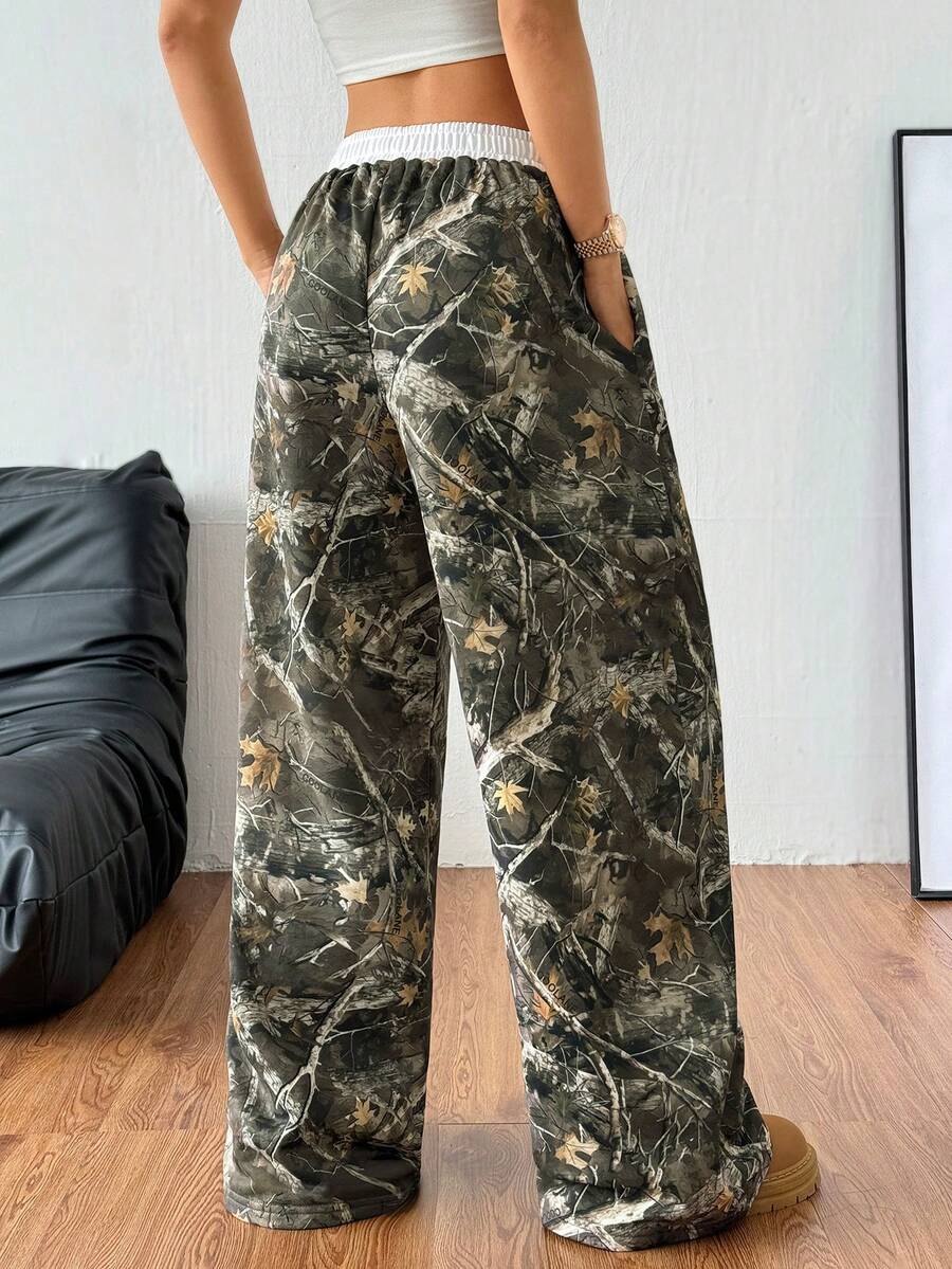Women's striped straight leg casual trousers with elastic mid waist and side pockets