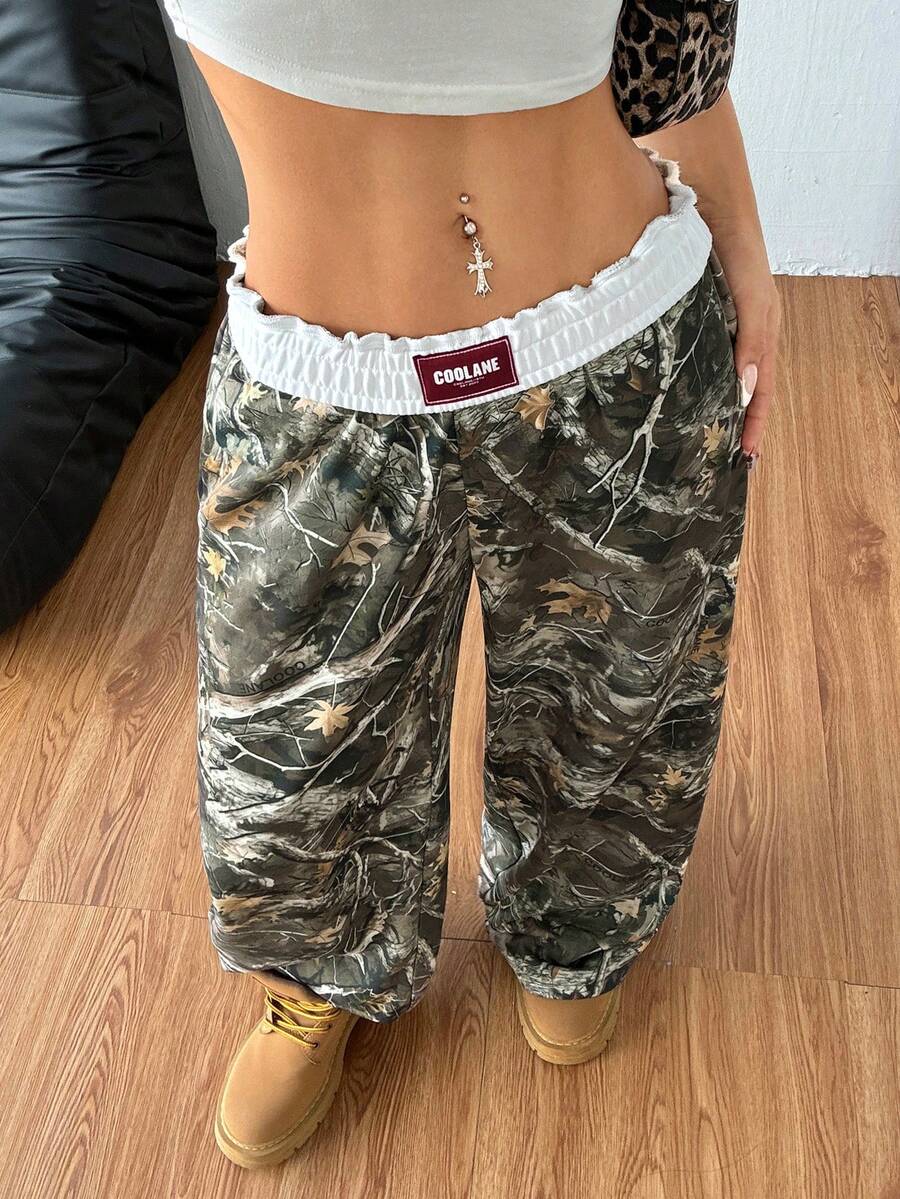 Women's striped straight leg casual trousers with elastic mid waist and side pockets