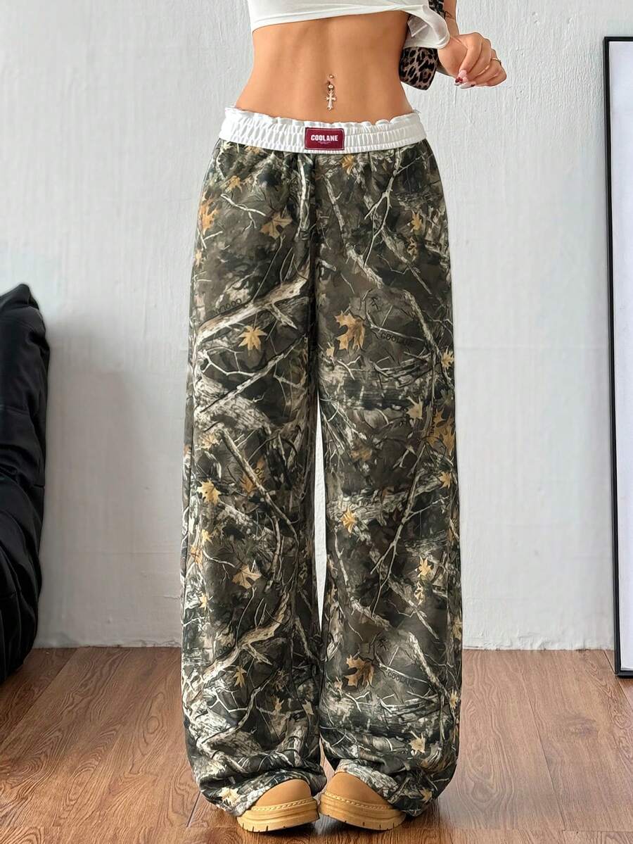 Women's striped straight leg casual trousers with elastic mid waist and side pockets