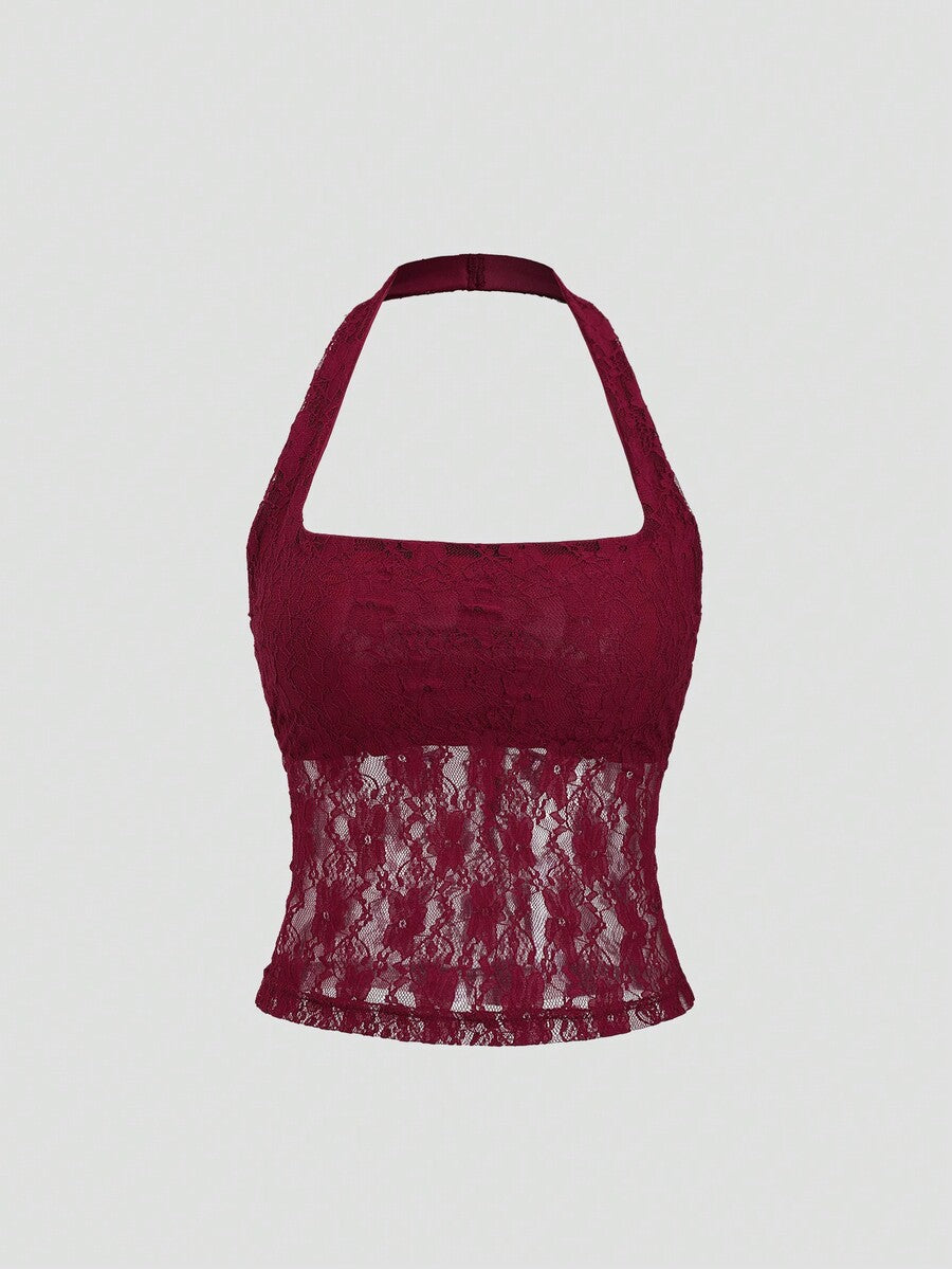 Women's solid lace halter top featuring a backless slim fit design with semi-sheer lace detail.