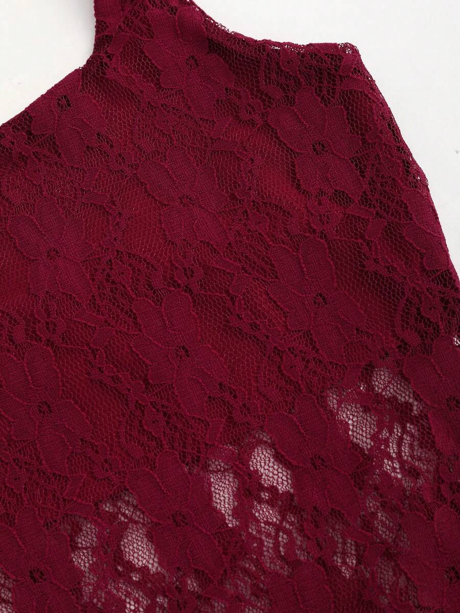 Women's solid lace halter top featuring a backless slim fit design with semi-sheer lace detail.